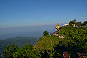 Myanmar - Kyaikhtiyo, several other stupas and shrines scattered on the ridge at the top of mount.